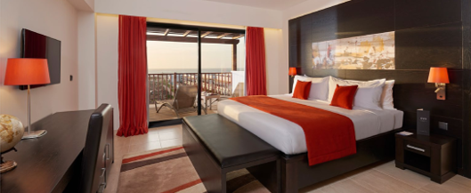 Official photograph of an available XCape238 room style with red accents